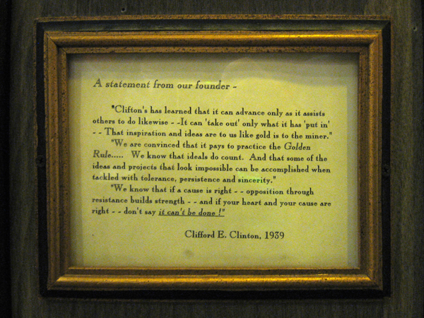 A framed quote from Clifford Clinton.